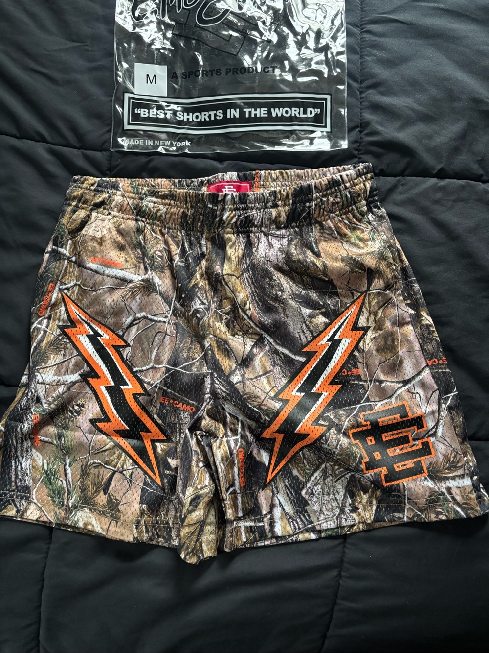 Eric Emanuel Camo Athletic Shorts with Orange Lightning Bolt